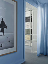 AVOLT office - Showroom entrance with AVOLT branding on office art.