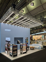AVOLT stand at Ambiente Frankfurt 2026 with metal retail displays and a lounge area.